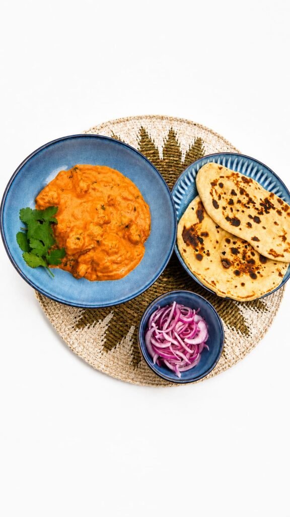 Butter Chicken with Homemade Naan and Pickled Onions